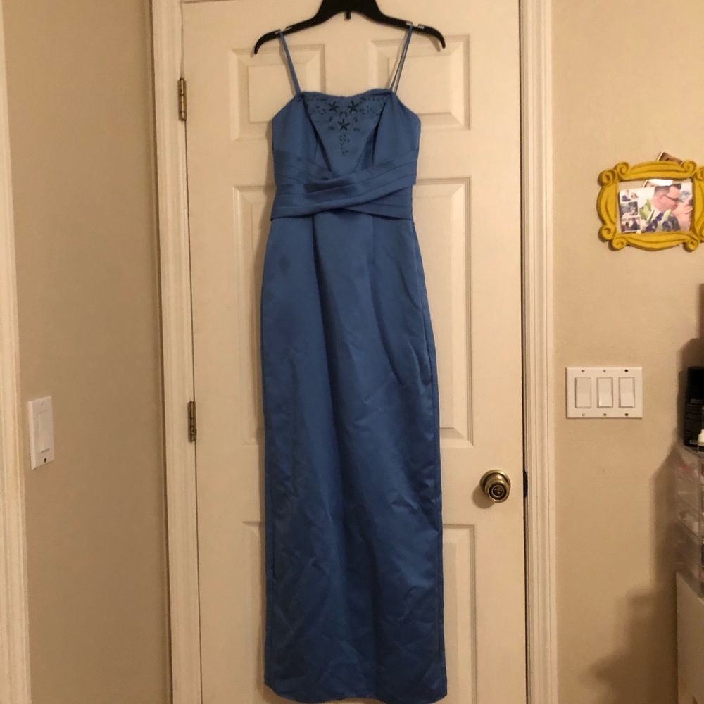 Blue spaghetti strap gown with beading in front